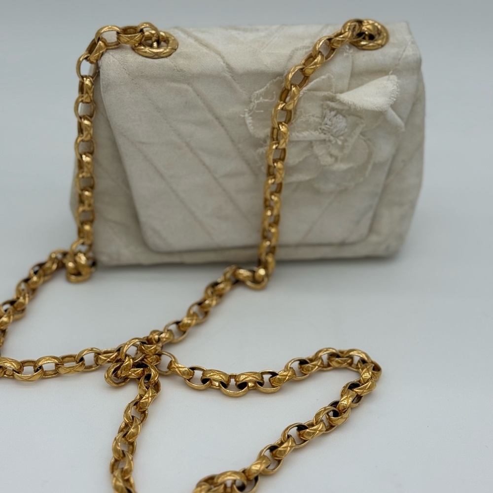 Elegant Cream Quilted Bag with Gold Chain